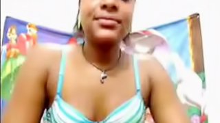 Bouncy Ebony babe masturbates her shaved pussy on webcam