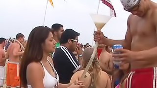Filthy girls show their boobs at a party on a beach