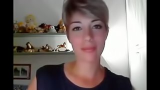 Very beautiful short hair girl pleasures her pussy