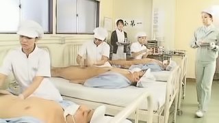 Asian Women Testing The Products In A Condom Plant