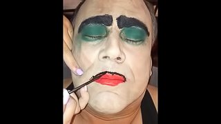Slave terry gets his makeup done by commander