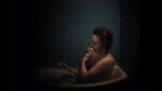 Busty mother masturbates in bath