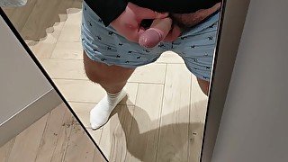 A very risky wank in the changing room!