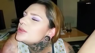 Hot tattooed amateur chick sucking a cock and his balls until he cums in her mouth