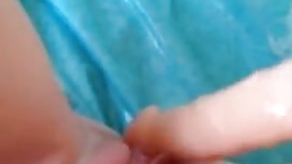 Sexy woman dildos her pussy then pees in bed