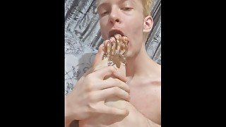 Skinny blonde covers his feet with Nutella and licks it off after