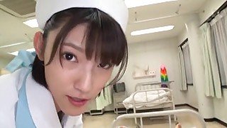 Japanese nurse Iioka Kanako enjoys sucking a dick on the bed