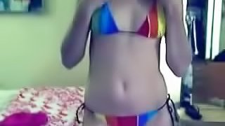 Webcam teen stripping off her tiny and sexy bikini