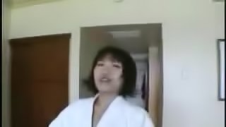 Chinese slutty girl is changing in a hotel room