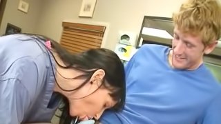 Sensual brunette gives a blowjob in the office
