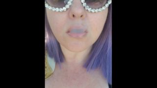 Hot big tittied giantess smokes a fag outside by the pool 