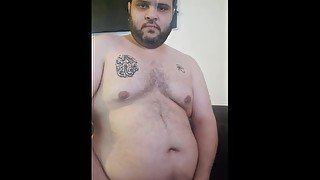 Fat arab infront of computer