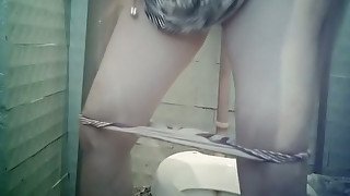 Pale skin stranger girl in the toilet wipes her pussy