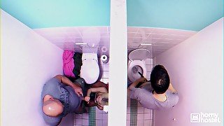 Lovita Fate masturbates and sucks a cock in the public toilet