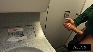 JERKING OFF AND CUMMING ON THE PLANE