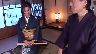 Gorgeous Japanese MILF in traditional clothing receives a hot facial