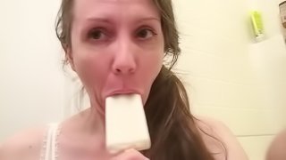Hairy MILF Lily Lark gets messy with a creamy white coconut popsicle