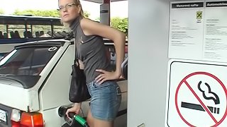 Slut at the gas station bathroom has gloryhole sex