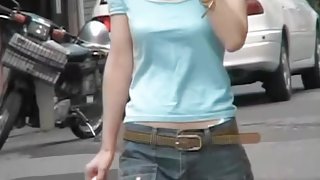 Slim Asian chick gets boob sharking on the street.