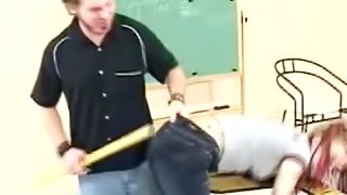 Sexy redhead teen's spanked by her teacher in class