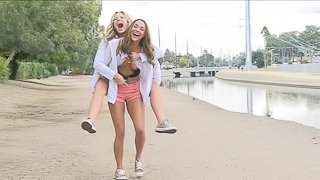 Public nipple sucking is bold between these two lesbian girlfriends