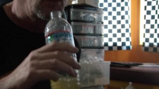 Pissing in a water bottle, twice, drinking it, for online Master