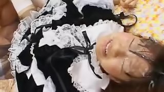 Asian babe swallowing in bukkake scene