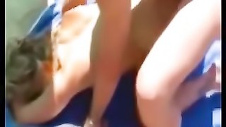 Nudist beach brunette gets eaten out in public
