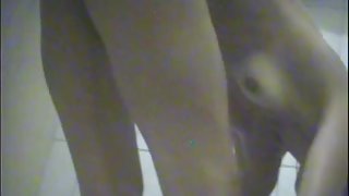 Girl showering body and dressing on spy cam in dressing room