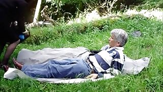 Older dude gets a blowjob in nature