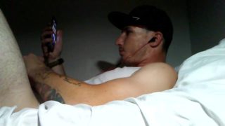 Tattooed white boy masturbates watching porn
