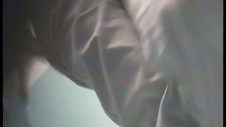 Girl is giving the quick flash of hairy pussy on voyeur cam