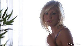 Sweet blonde Hayden Hawkens spends time fingering her pussy