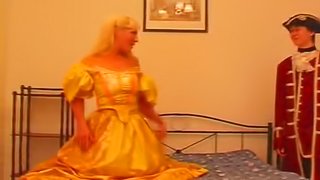Icy hot redhead in a retro costume takes a cumshot after a hardcore humping