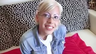 Kinky short-haired blonde Daniella toys her snatch before fisting it