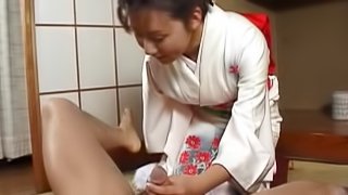Asian slut masturbates that hard dick