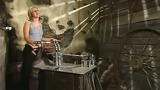 Jolene gets her ass and vag drilled by a fucking machine in a cellar