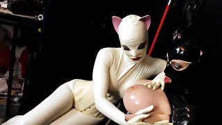 Super hot lesbian scene with two sexy kitties in latex