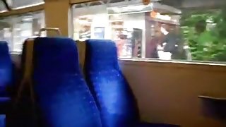 Crazy milf masturbates her shaved pussy upskirt with a flask in a public train