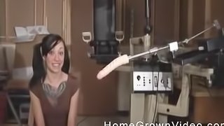 Cutie with a big tattoo enjoys being fucked with a sex machine
