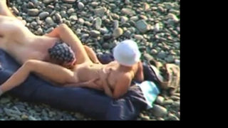 Voyeur on public beach. Oral sex