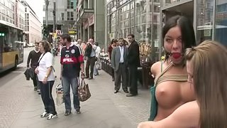 Curvaceous babes walk naked in the street and get fucked