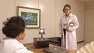 In the office a Japanese doctor fucked by two of her assistants