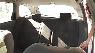 Redhead beauty agrees for fuck on taxi spycam video