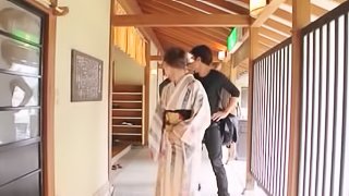 Alluring Japanese babe is happy to play with a couple of cocks