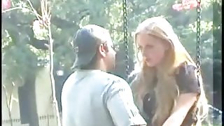 Blonde's kissing a guy on a public street