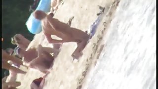 Hidden voyeur camera takes a look around the beach