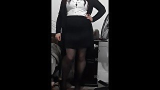 Crossdresser wearing black pantyhose