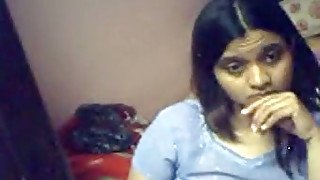 Webcam solo action with Indian teen fingering her cunt