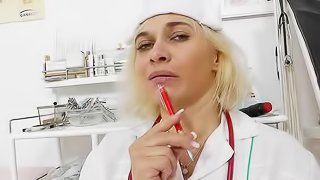 Horny mature amateur nurse masturbating with toys at work